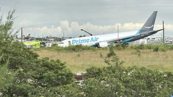NEW -  Amazon cargo plane crashes while landing at Miami International Airport, Miami-Dade Fire Rescue says the plane 
