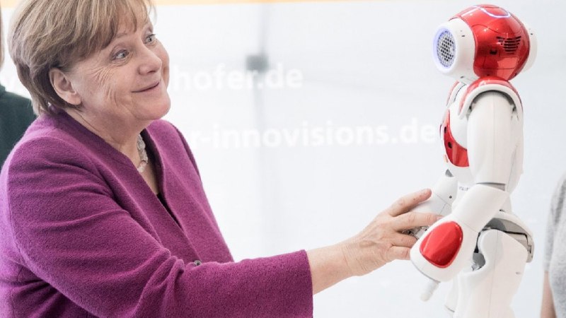 NEW - 72-year-old Merkel calls for AI regulation, but hopes robots can do the housework 